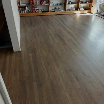 Engineered hardwood floor in a bright living room installed by Providence Flooring